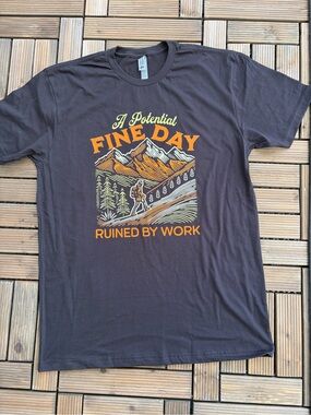 Next Level Apparel Black Graphic Tee with Orange & Green Mountain Design